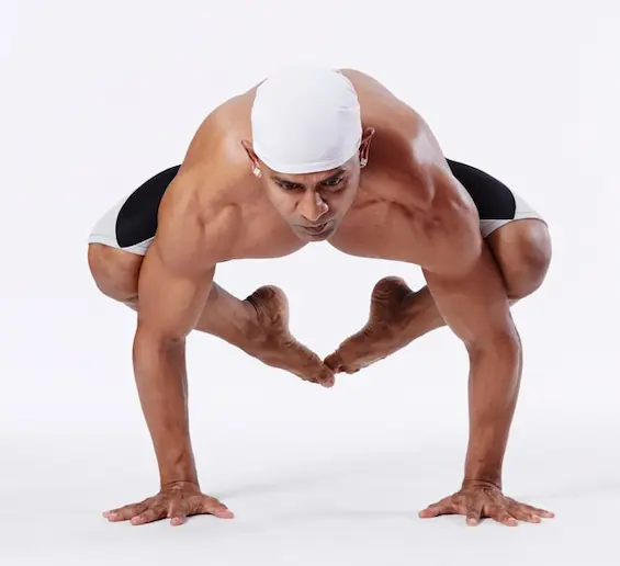 man in backwards yogic pose