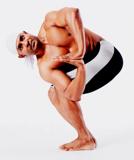 man in backwards yogic pose